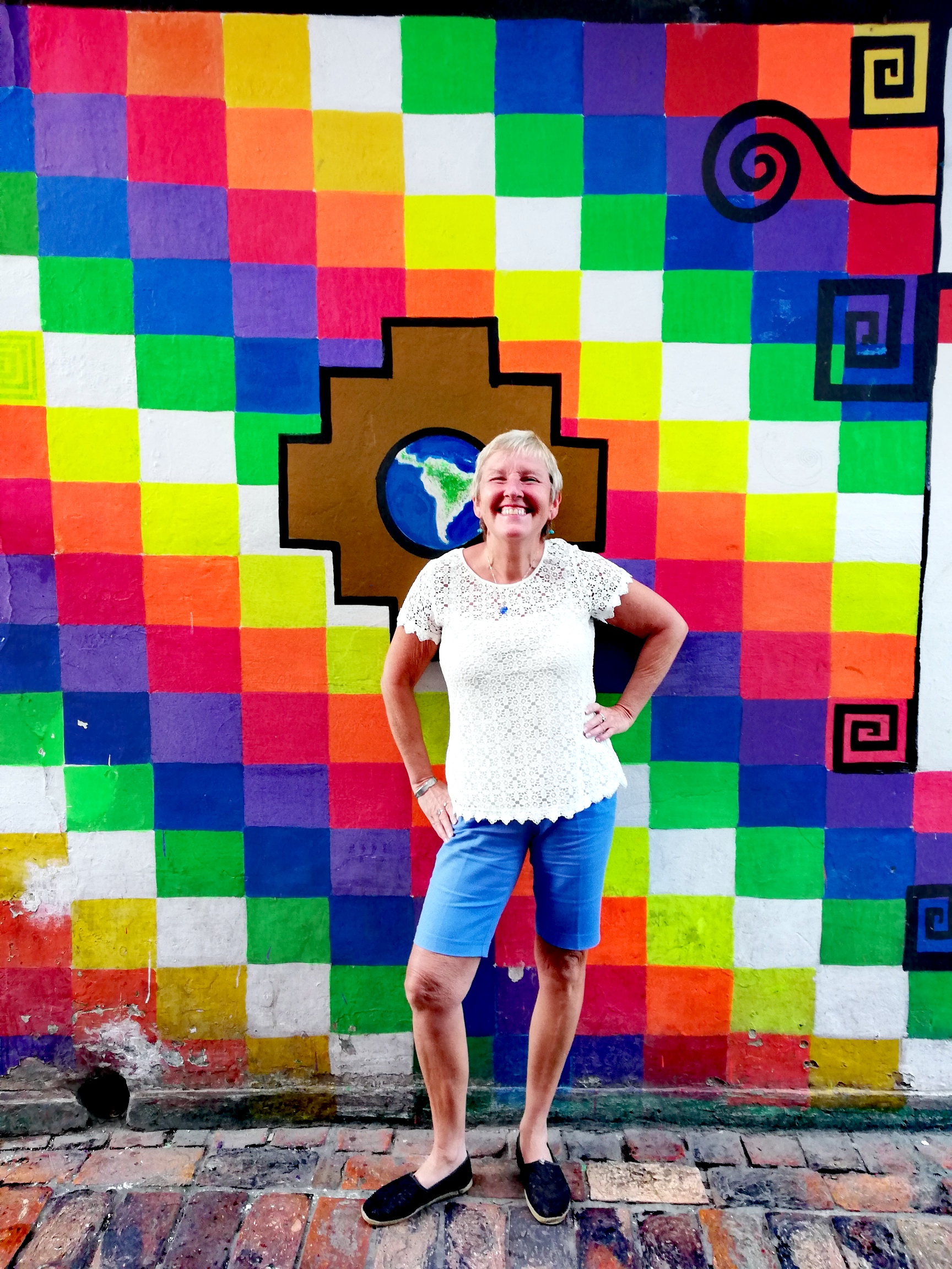 Me against a backdrop of street art in Bogota