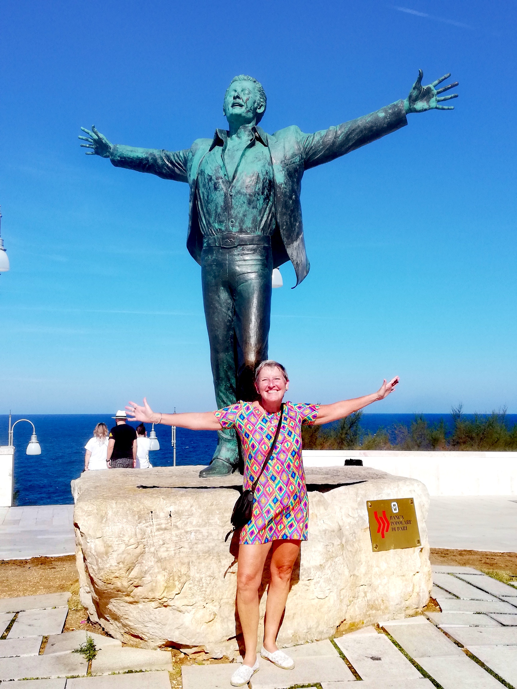 Lynn and a statue in Puglia, Italy